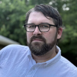 Chris Kingsley as Theo Lambert, Alex Hargrave for the Rambling Roads Mysteries